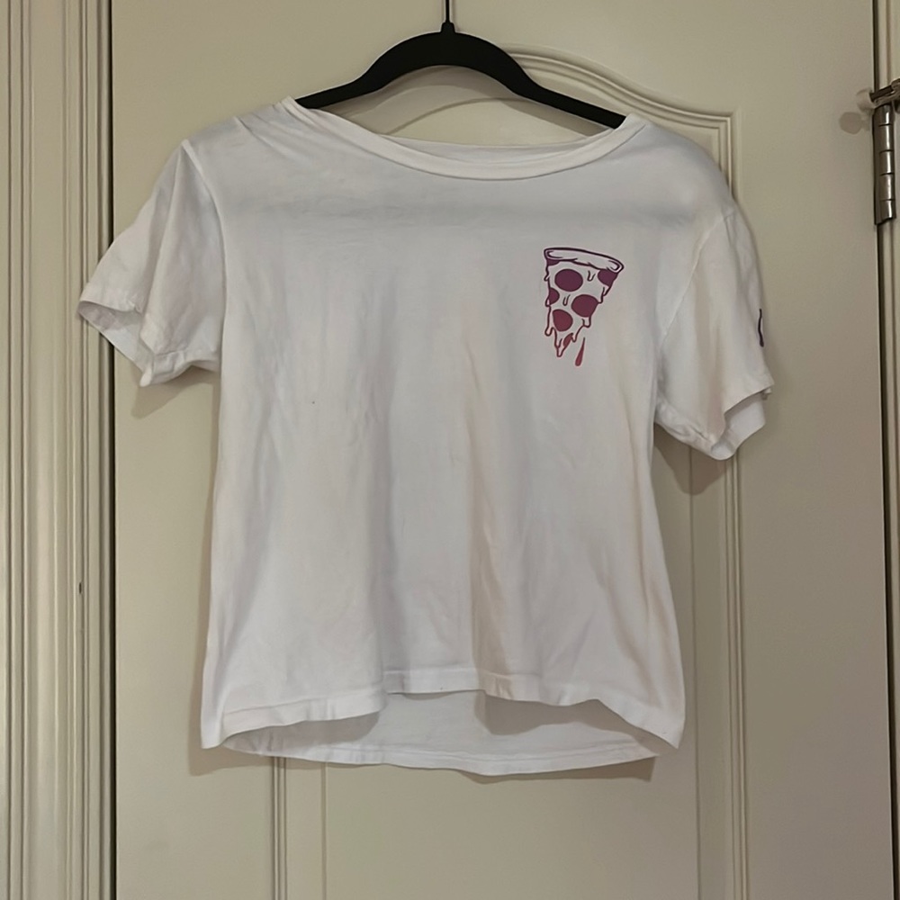 White tee, colors are gradient with purple pink, light red